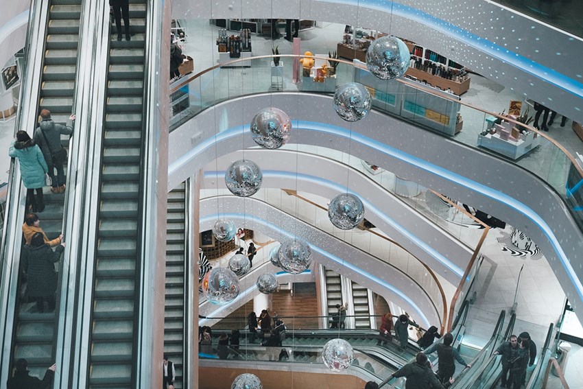 People riding a escaltor